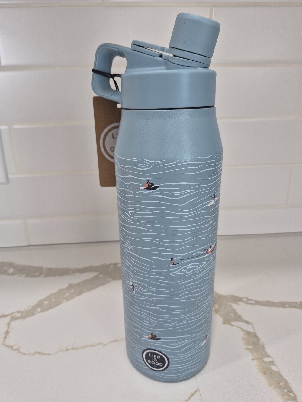 Life Is Good Tidal Blue Water Bottle with Water Sports In Action.